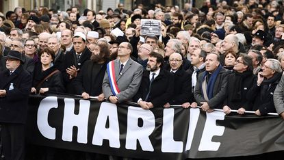 (From L) Samuel Sandler,father and grandfather of three of the victims of Islamist gunman Mohamed Merah, the Mayor of Lille and Socialist Party member Martine Aubry, Hassen Chalghoumi, Imam o
