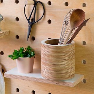kitchen utensils with plant pot and spoons