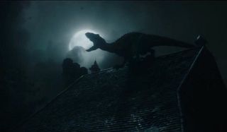 Jurassic World: Fallen Kingdom the Indoraptor howls in the moonlight on the roof