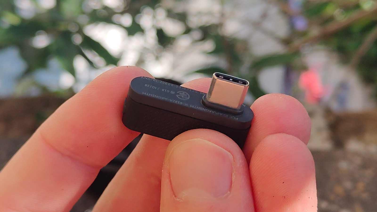 The AKG N5 in a man's hand.