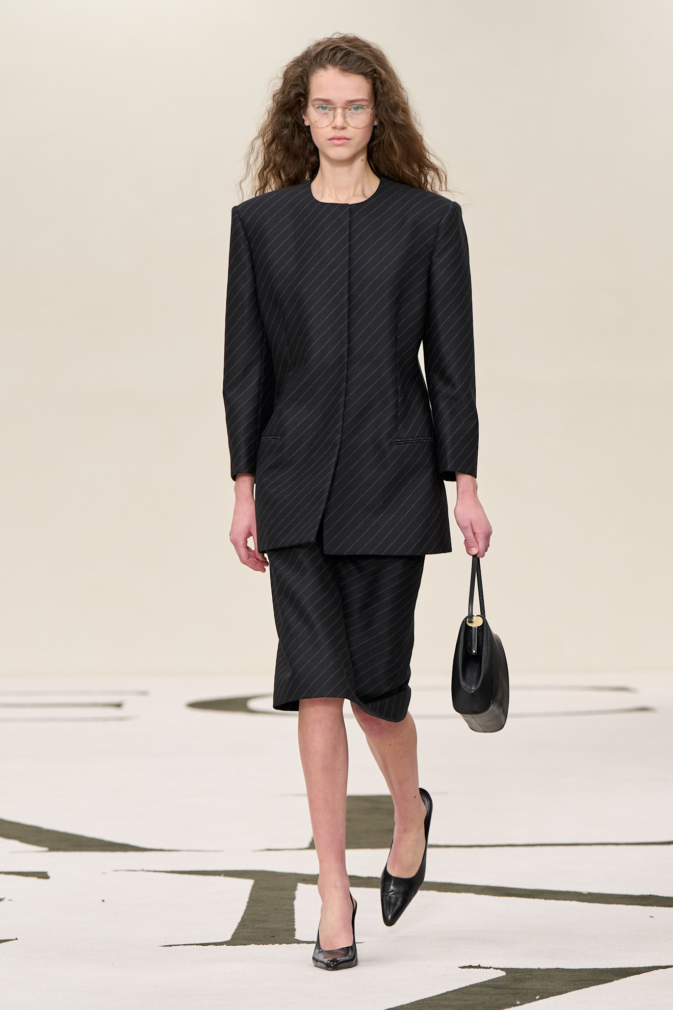 Model walking in Calvin Klein Fall Winter 2025 show.