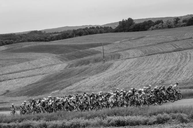 The peloton passes through some of the wide open Wisconsin countryside.