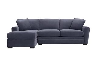 A dark grey sectional chaise couch