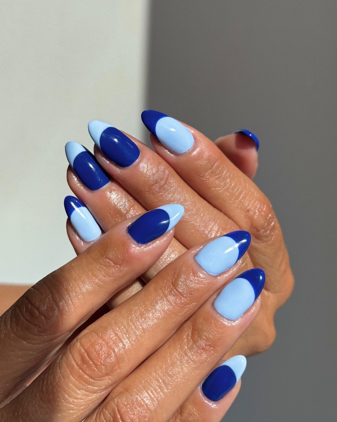 A blue cream manicure by Queenie Nguyen
