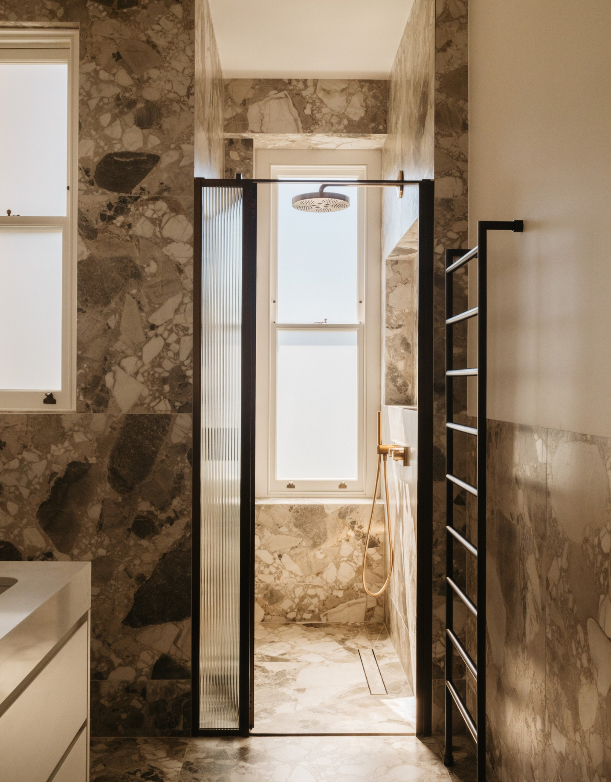 beautiful modern bathroom, with grey marble finishes throughout