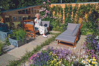 woman sat in garden