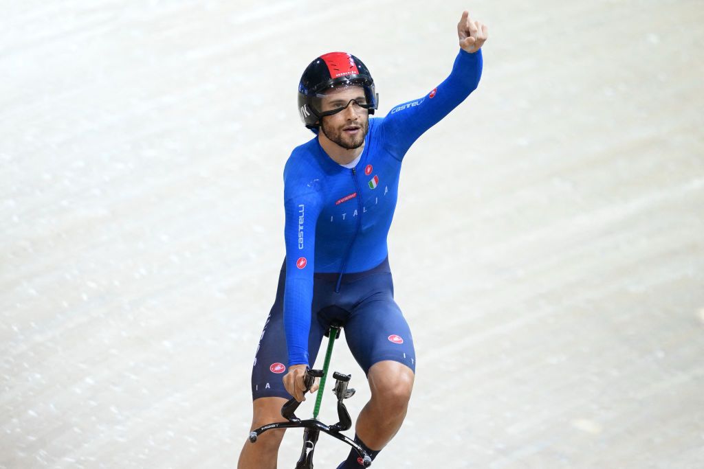 Filippo Ganna celebrates after breaking the individual pursuit world record at the UCI Track World Championships 2022