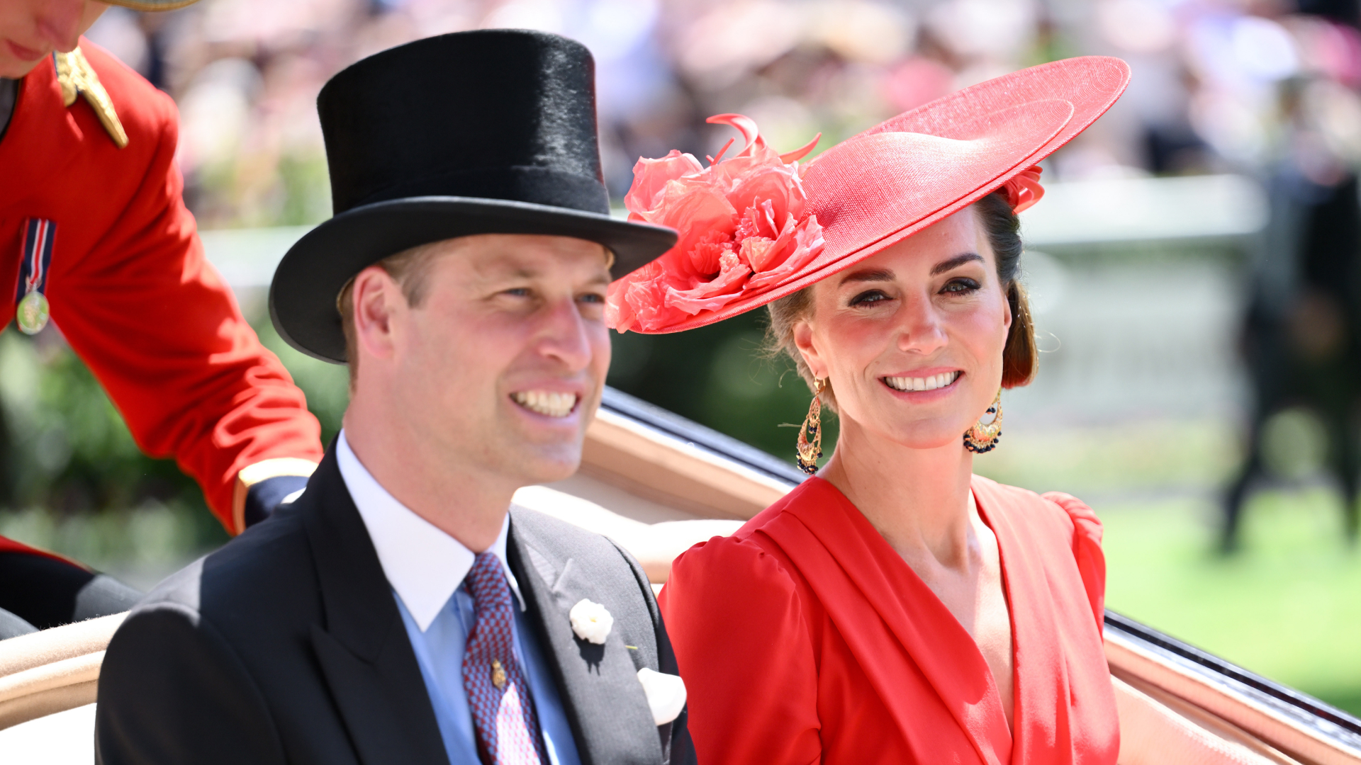 Prince William wears a top hat and tails and Kate Middleton wears a bright red dress and matching hat as they arrive at Royal Ascot 2023