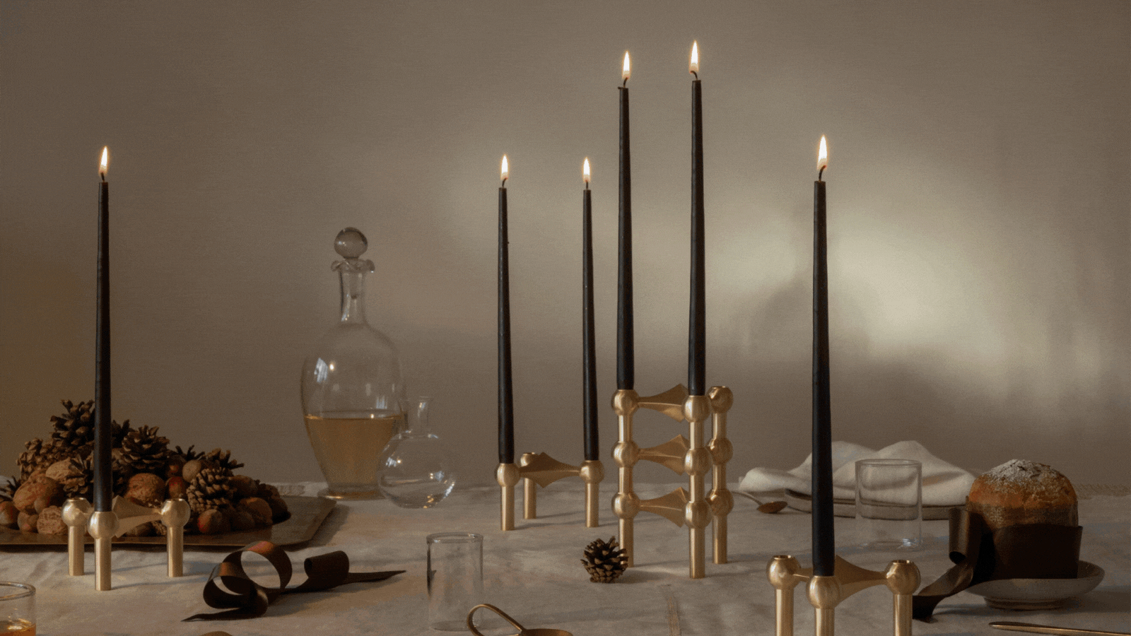 A rotating gif of festive pictures, including vintage shots in black and white and lifestyle shots of decked Christmas tables.