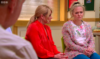 Sharon watches nervously as Linda speaks at an alcohol support meeting