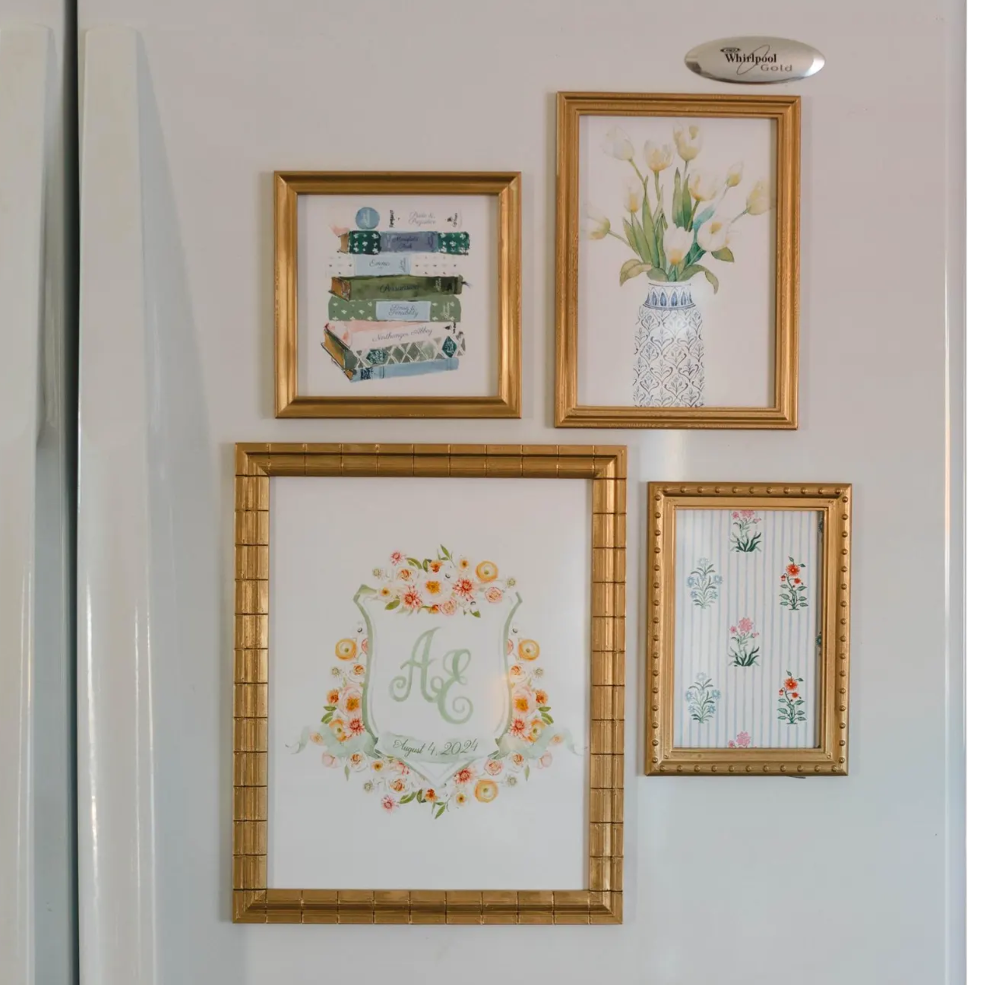 set of four picture frames hanging from a refrigerator 