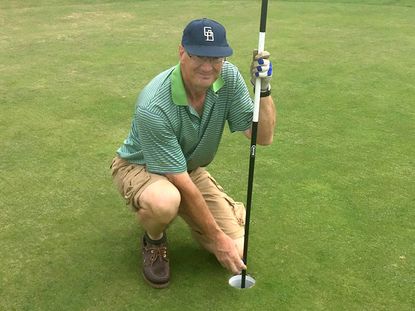 Golfer Makes Hole-In-One With Putter