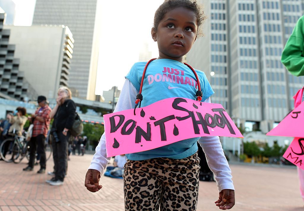 Nimani Darch-Walker, 3, marches at a Black Lives Matter protest in San Francisco