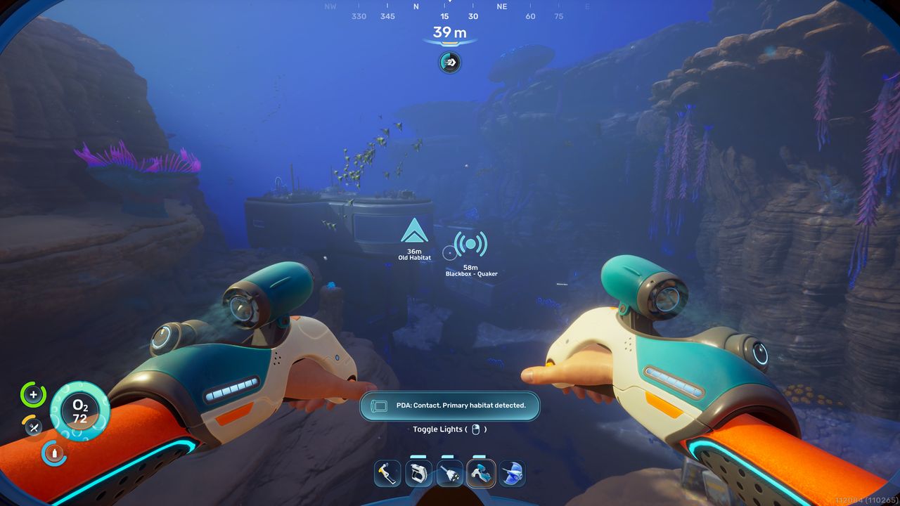 Subnautica 2 mining: A player swimming towards the Old Habitat, using the Wakemaker.