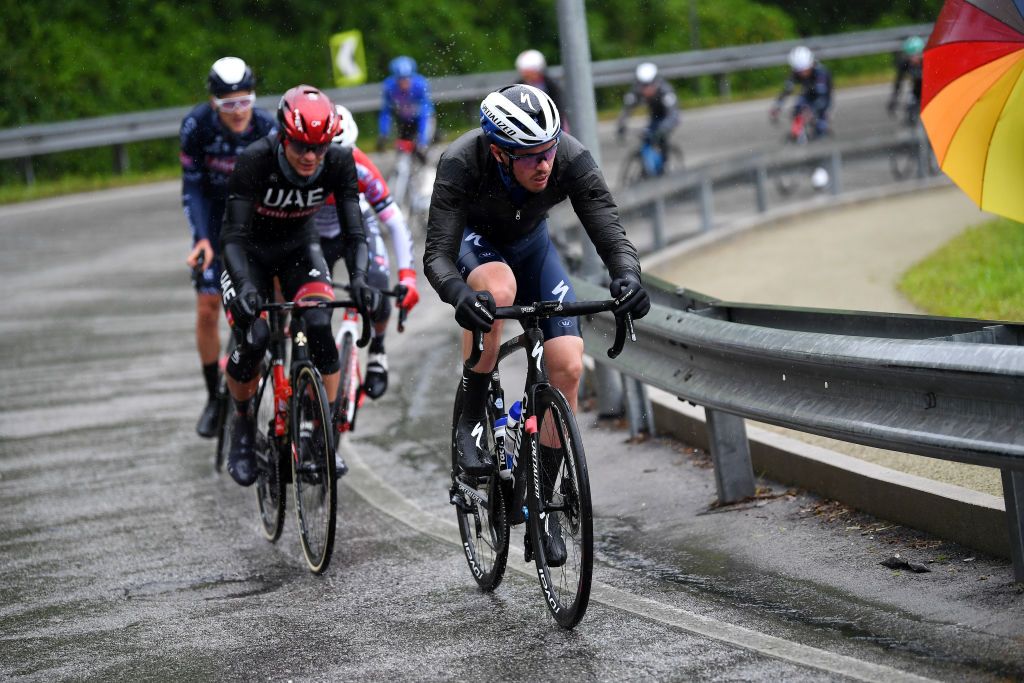 CORTINA DAMPEZZO ITALY MAY 24 Remi Cavagna of France and Team Deceuninck QuickStep during the 104th Giro dItalia 2021 Stage 16 a 153km stage shortened due to bad weather conditions from Sacile to Cortina dAmpezzo 1210m Rain girodiitalia Giro on May 24 2021 in Cortina dAmpezzo Italy Photo by Tim de WaeleGetty Images