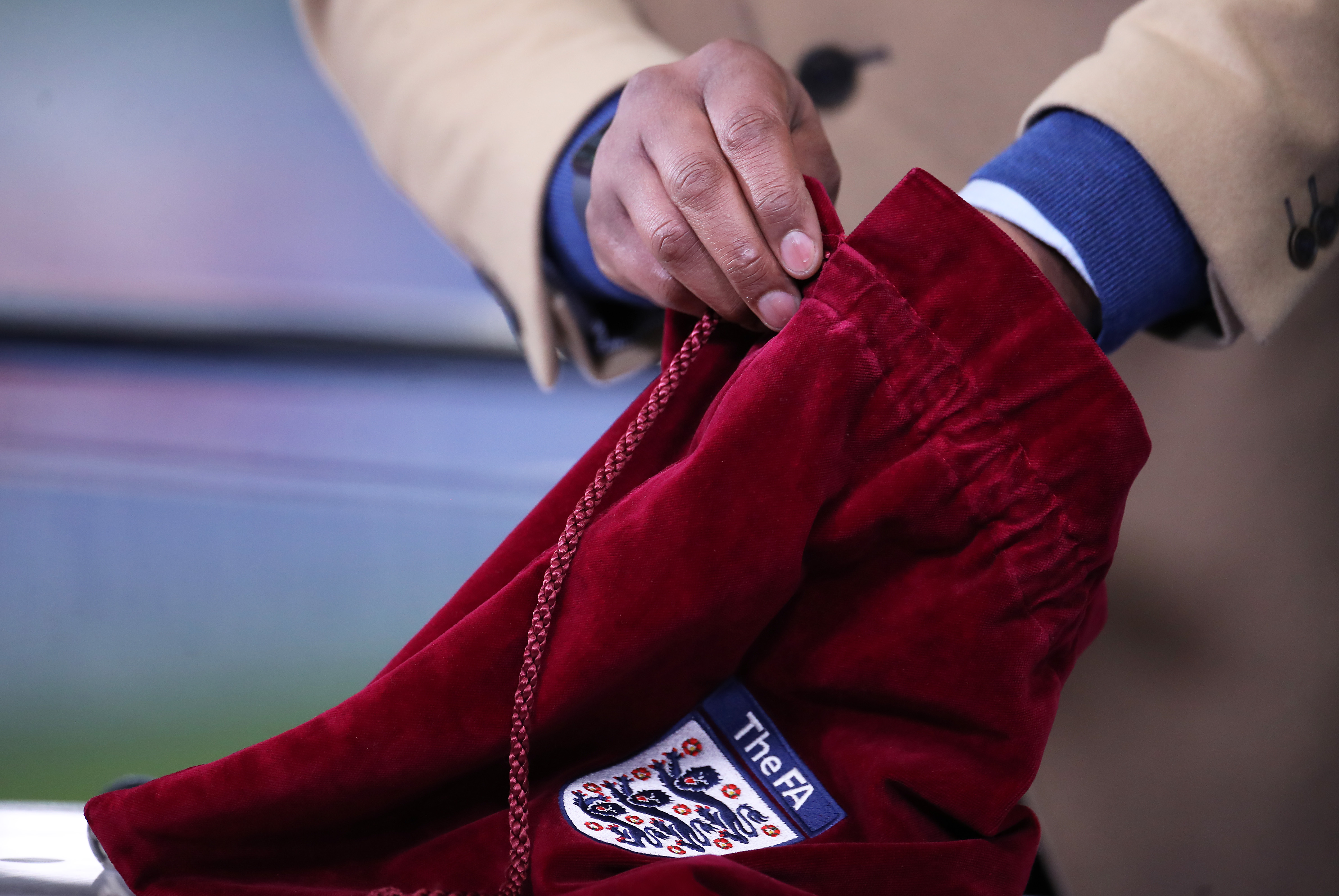 LEICESTER, ENGLAND - MARCH 21: Dion Dublin, BBC Sport TV Presenter performs the FA Cup Semi Final draw which is made at half time from inside the stadium during the Emirates FA Cup Quarter Final match between Leicester City and Manchester United at The King Power Stadium on March 21, 2021 in Leicester, England. Sporting stadiums around the UK remain under strict restrictions due to the Coronavirus Pandemic as Government social distancing laws prohibit fans inside venues resulting in games being played behind closed doors. (Photo by Alex Pantling/Getty Images)