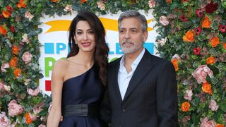 George Clooney and Amal Clooney attend the People's Postcode Lottery Charity Gala at McEwan Hall