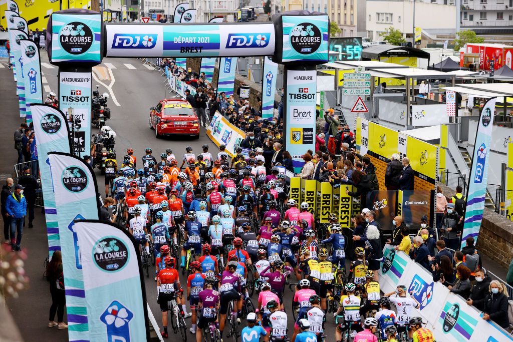 LANDERNEAU FRANCE JUNE 26 The peloton at start in Brest during the 8th La Course By Le Tour De France 2021 a 1077km race from Brest to Landerneau Cte De La Fosse Aux Loups 176m Landscape LaCourse LeTour TDF2021 UCIWWT on June 26 2021 in Landerneau France Photo by Tim de WaeleGetty Images
