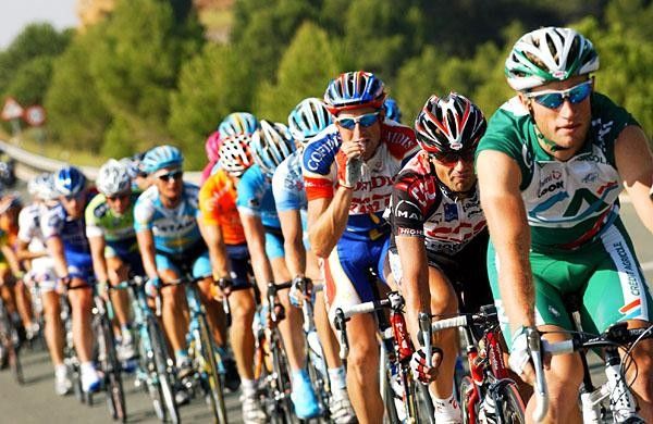 Riders fuel up and work on their tan lines