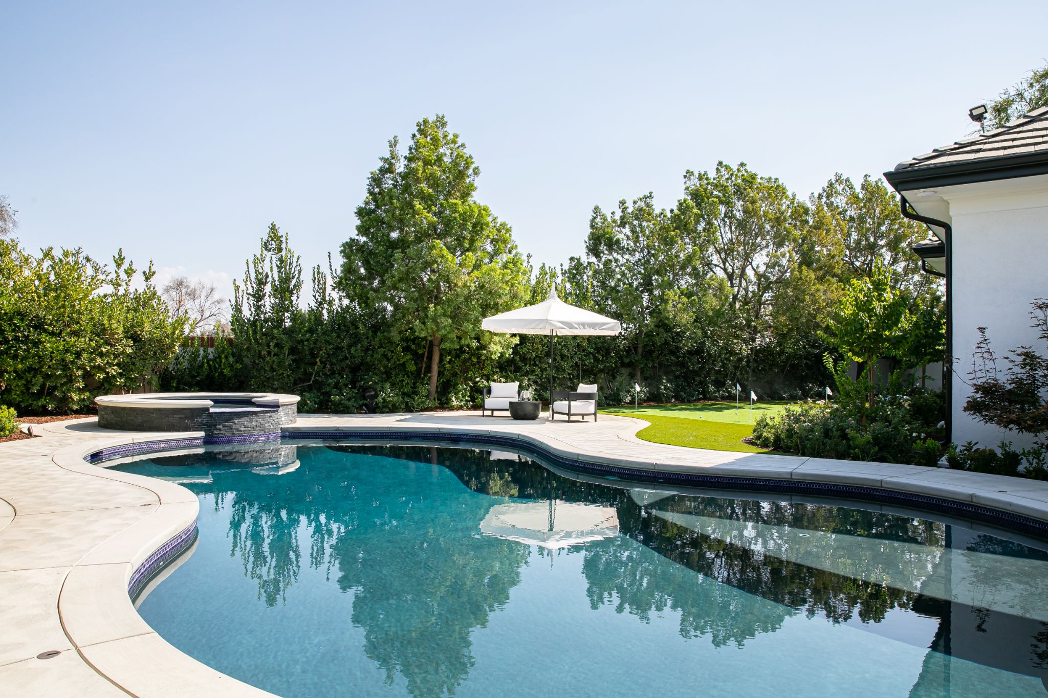 Pool Landscaping Ideas: The Best Materials To Use In And Around A Backyard  Pool | Homes & Gardens |
