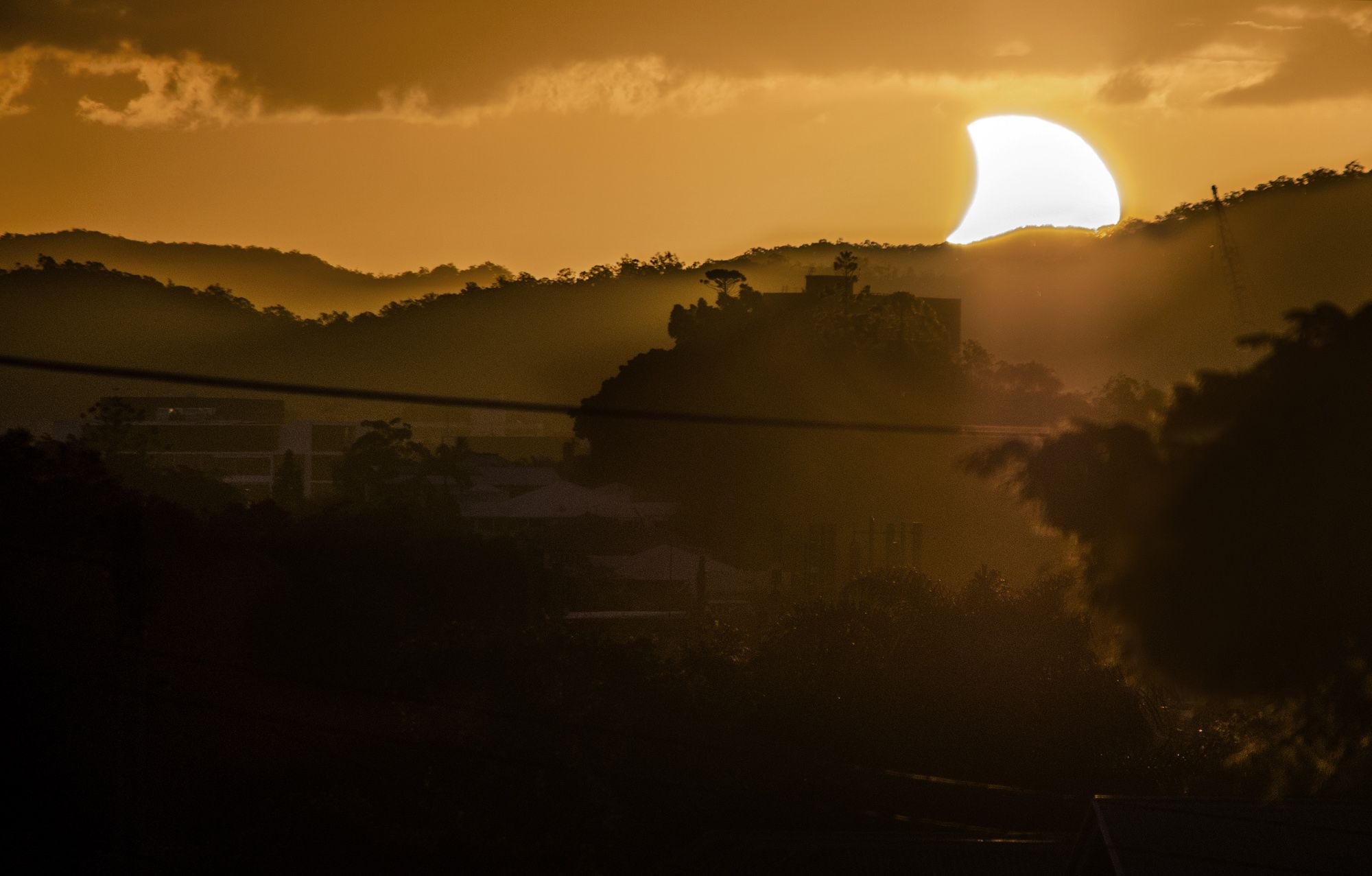 Partial Solar Eclipse Occurs at Sunset Today: Watch It Live | Space