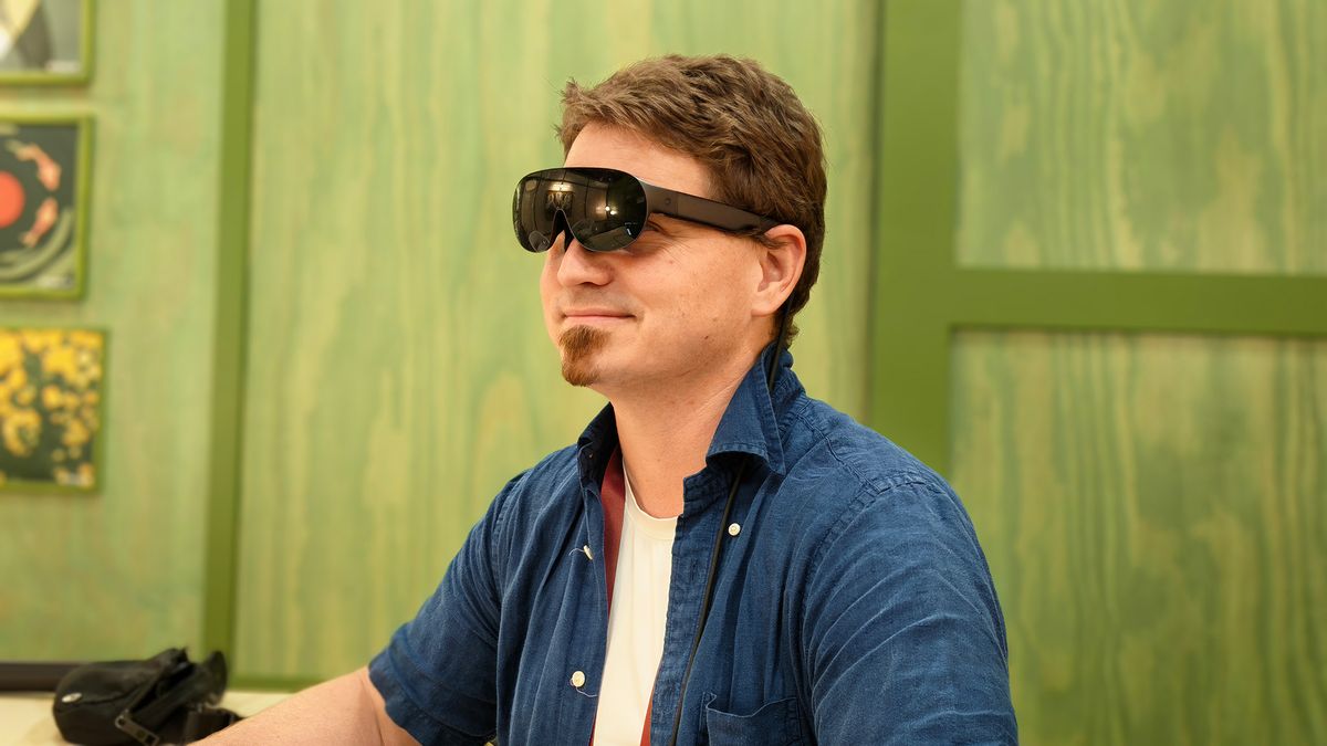 Wearing the standard-sized Meta VR glasses