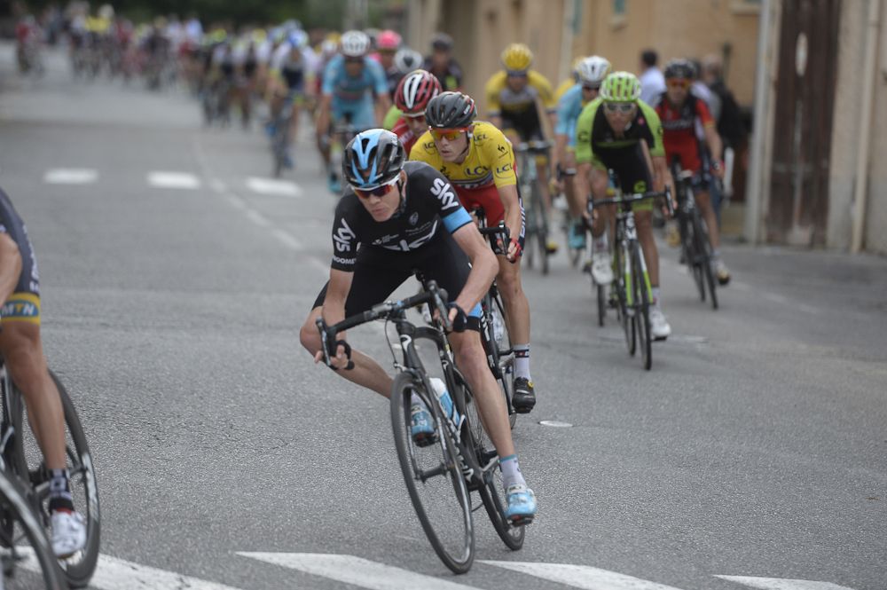 Chris Froome negotiates a corner near the end of the stage.