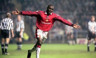 Andrew Cole celebrates scoring for Manchester United
