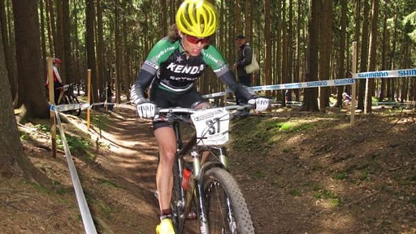 Mary McConneloug pushes on after a crash in the Czech Republic