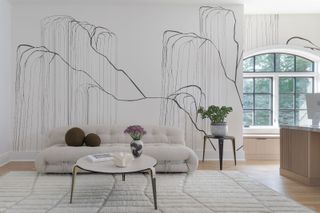 A living room with mural