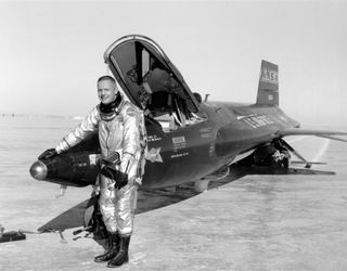 Neil Armstrong poses with the X-15 experimental aircraft on April 20, 1962.