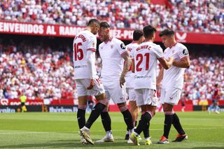 Youssef En-Nesyri celebrates after scoring for Sevilla against Celta Vigo in March 2024.