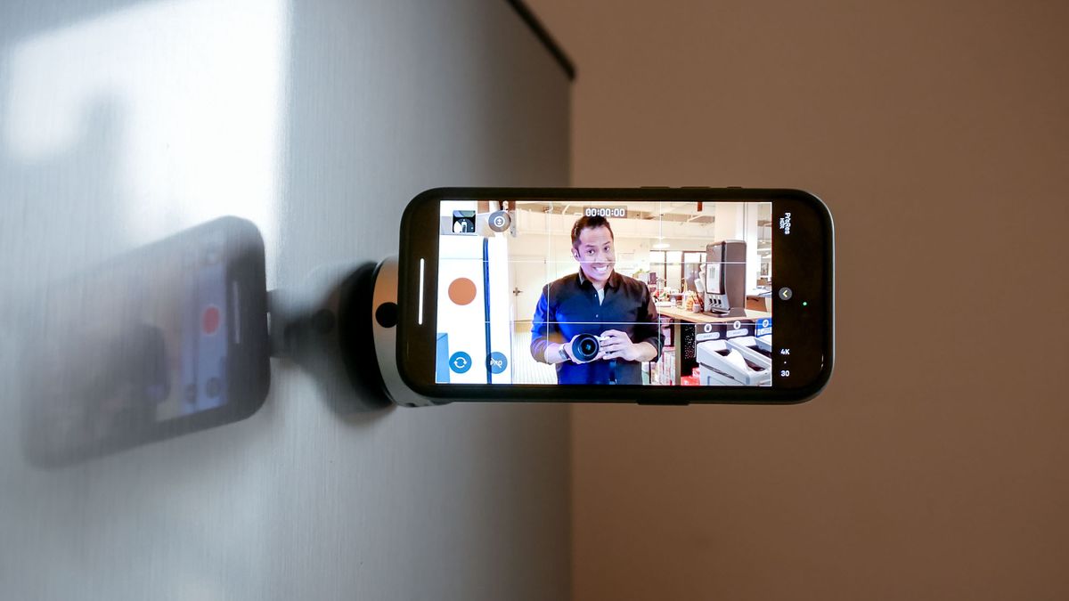 Lisen Electric Vacuum Magnetic Phone Holder Stand on surface.