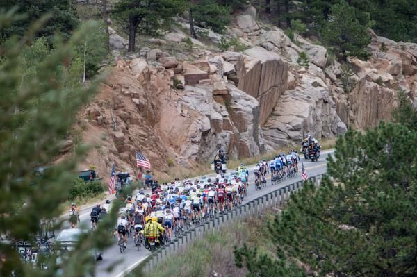 The peloton rolls along amidst some typical Colorado scenery during stage five.