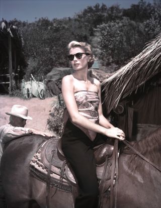 grace kelly on a horse