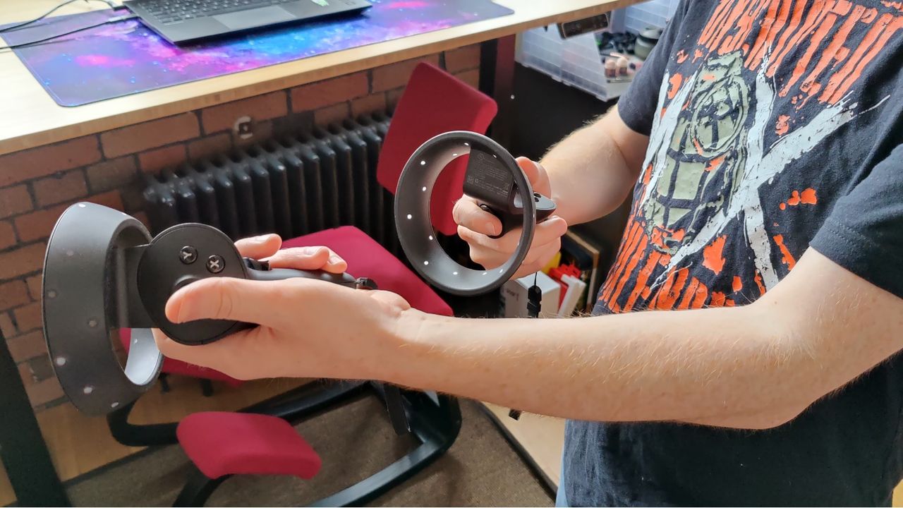 Close up of HP Reverb G2 VR Controllers in hands - held like a gun