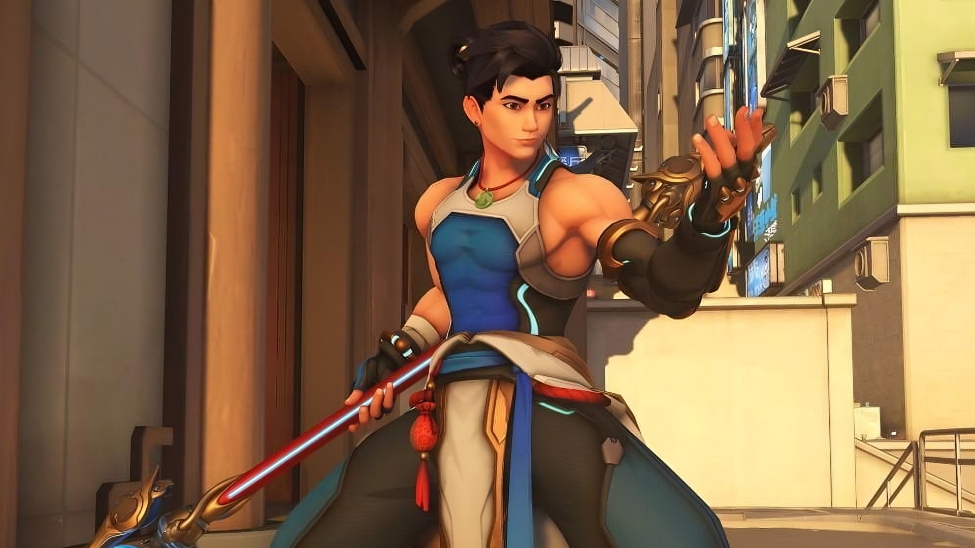 Overwatch 2 Wuyang: The new hero Wuyang posing with his left arm out, as if beckoning, and his right arm behind his back holding his staff.