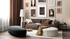 A brown and grey living room with curved soft upholstered sofa furniture and stool with framed gallery wall