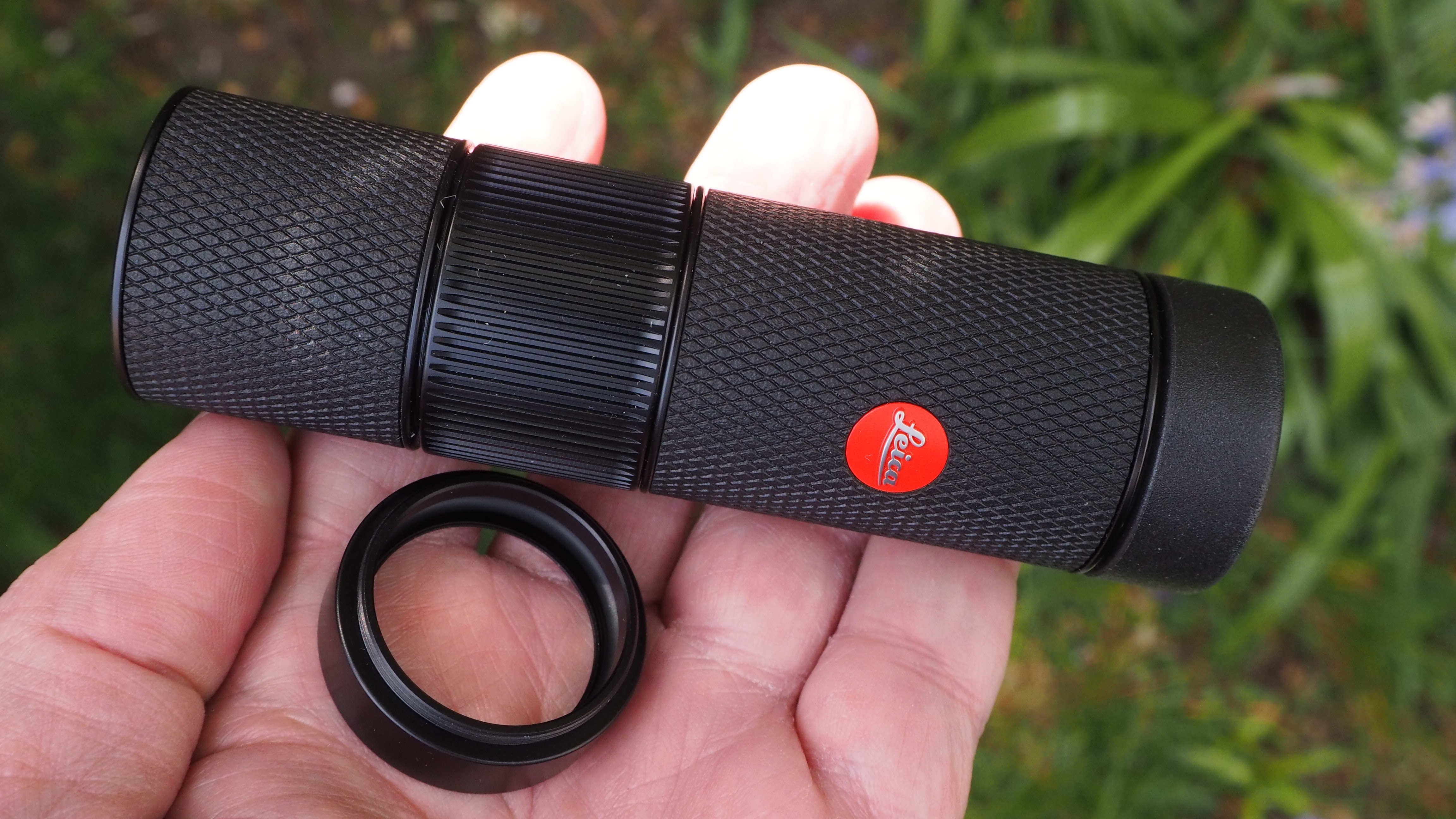 Leica Monovid 8x25 monocular held in someone's hand