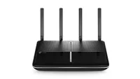 TP-Link Archer VR2800 wireless router finished in black colorway and shown on a white background