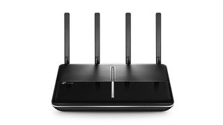TP-Link Archer VR2800 wireless router finished in black colorway and shown on a white background