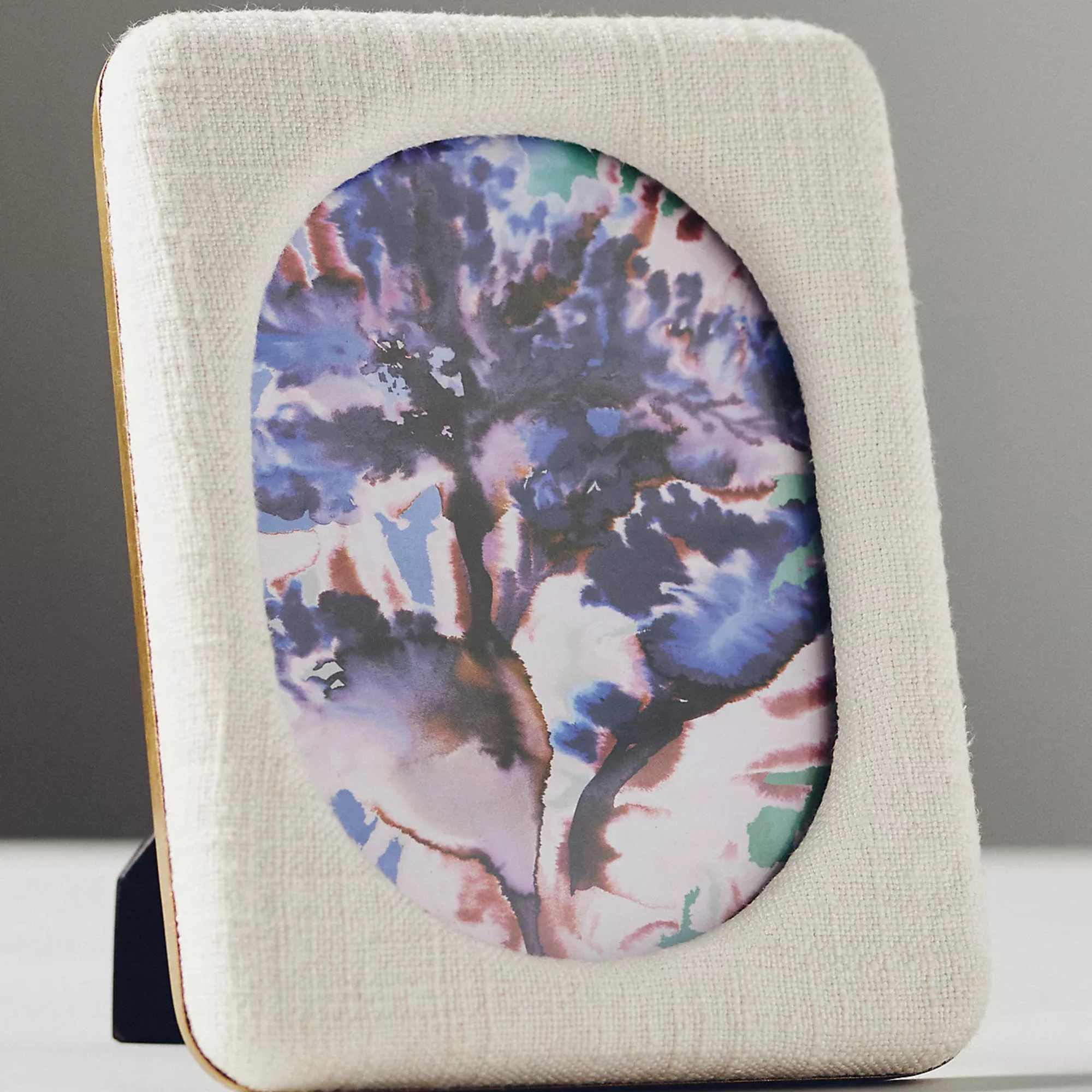 An off-white textured picture frame