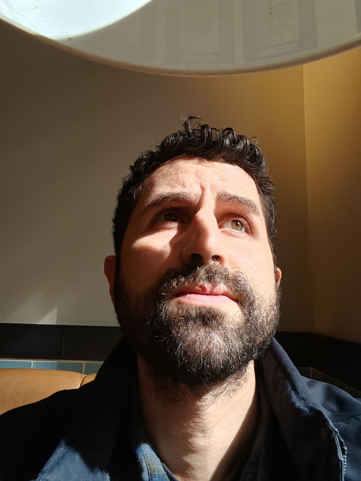 A high-contrast photo captured on the Magic 5 Pro's selfie camera