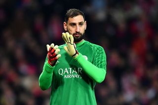 Gianluigi Donnarumma of Paris Saint-Germain claps during the UEFA Champions League 2024/25 League Knockout Play-off first leg match between Stade Brestois 29 and Paris Saint-Germain at Stade de Roudourou on February 11, 2025 in Guingamp, France.