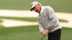 Fred Couples hits a putt at Augusta National
