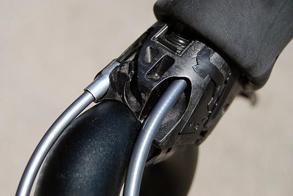 Derailleur cables are concealed beneath the bar tape