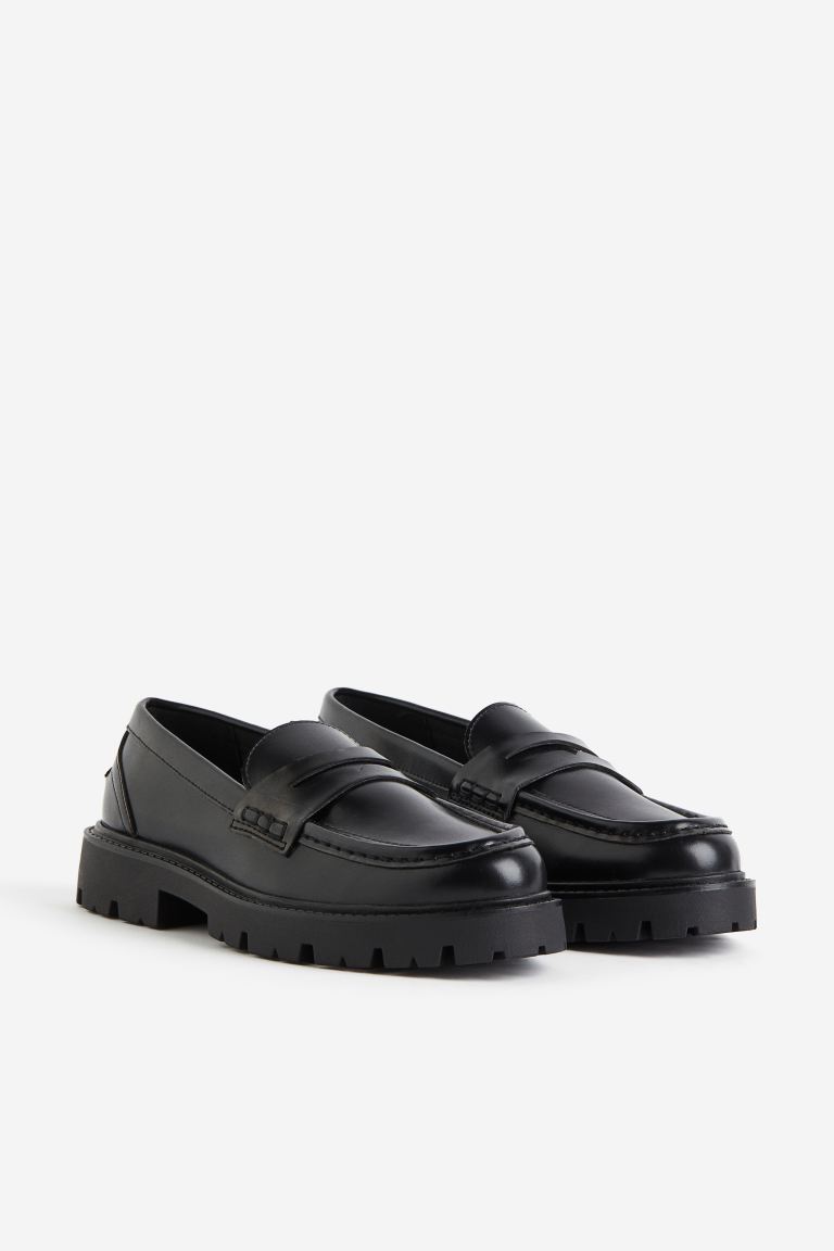 black loafers with chunky lug soles