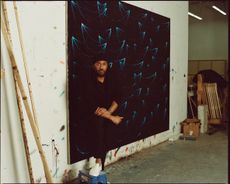 Rashid Johnson stands in front of his work Seascape Painting ‘Angola’, 2022, oil on linen