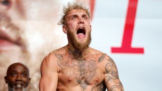 YouTube boxer Jake Paul flexes and roars ahead of his bout with Nate Diaz. 