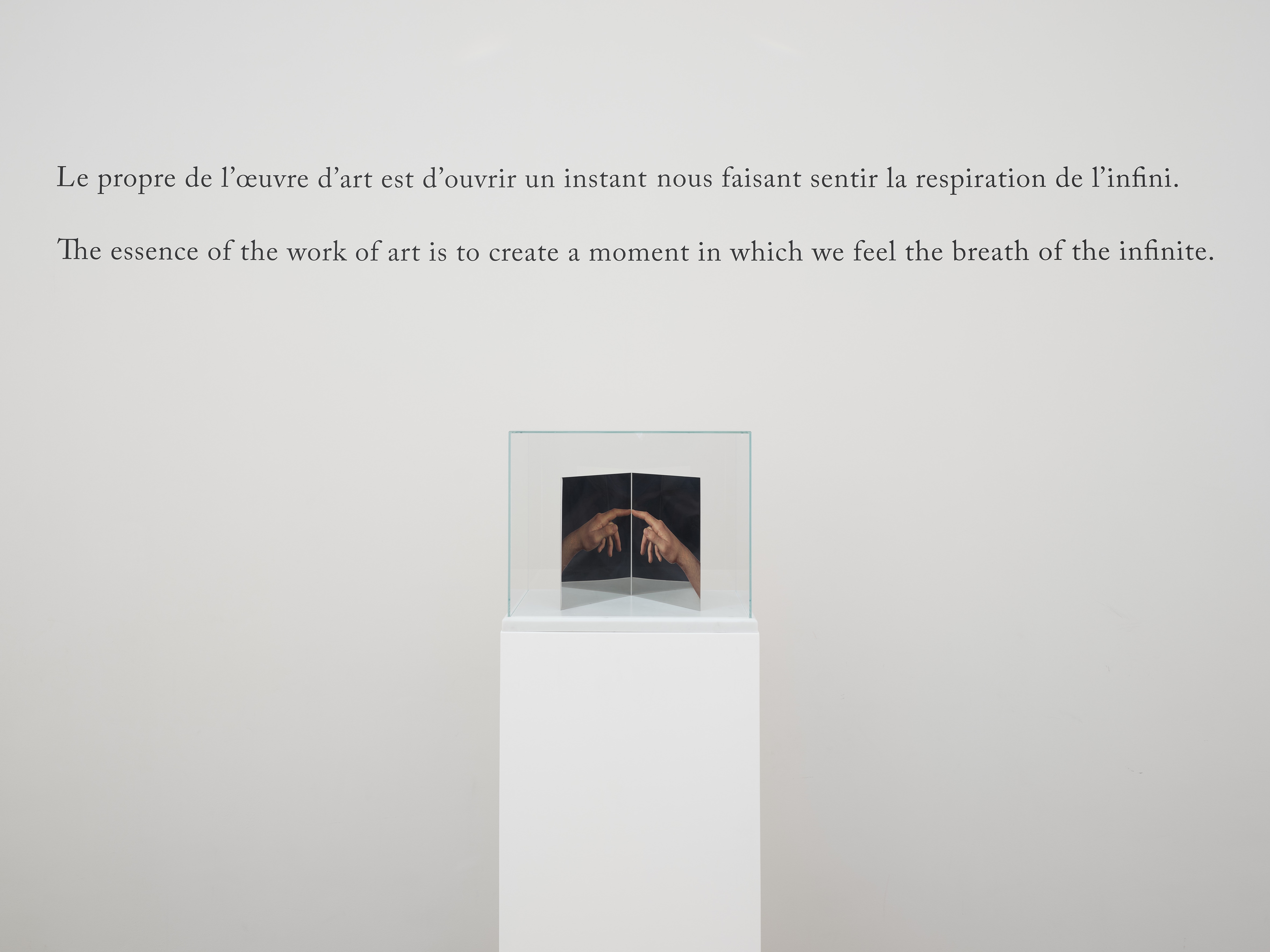 Installation shots of a painting and sculpture exhibition set within a palatial building.